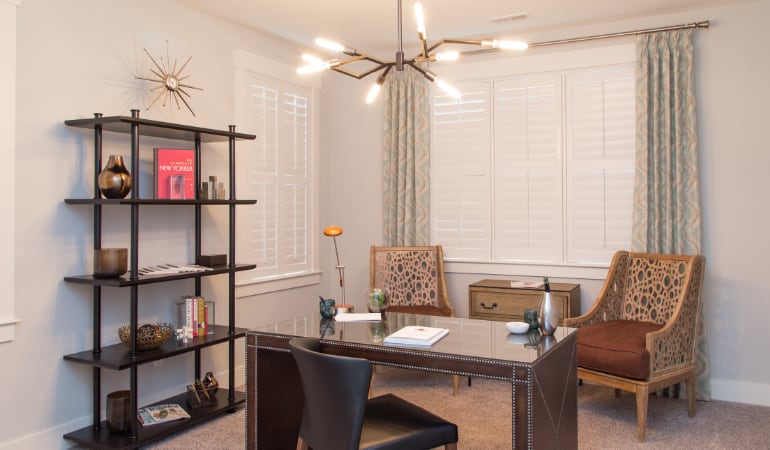 Gainesville home office with plantation shutters.
